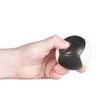 Firetoys black/white 110g thud juggling ball being squeezed