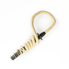 Gora fire whip with the whip wrapped around the handle