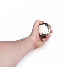 Oddballs bounce juggling ball black in hand