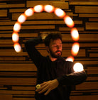 performer spinning flowtoys flowmoja contact poi