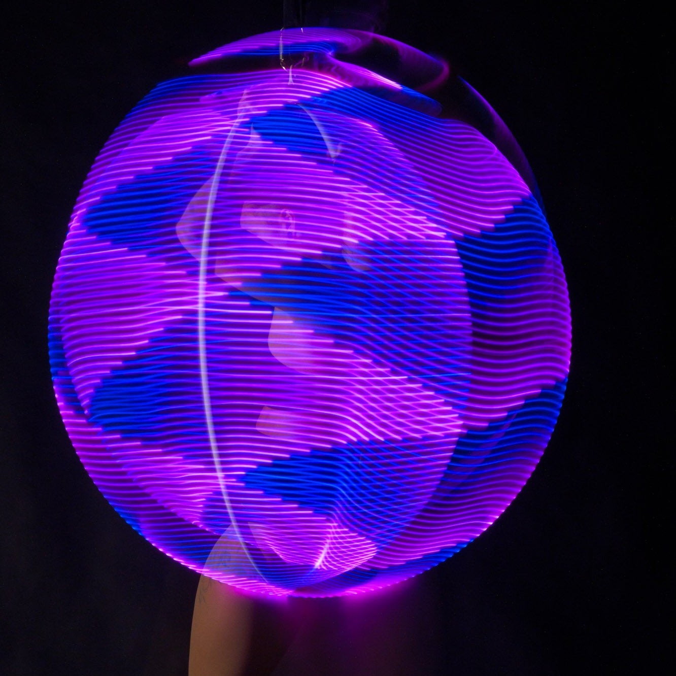 Light trails hoop glowing purple