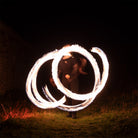 performer with fire poi