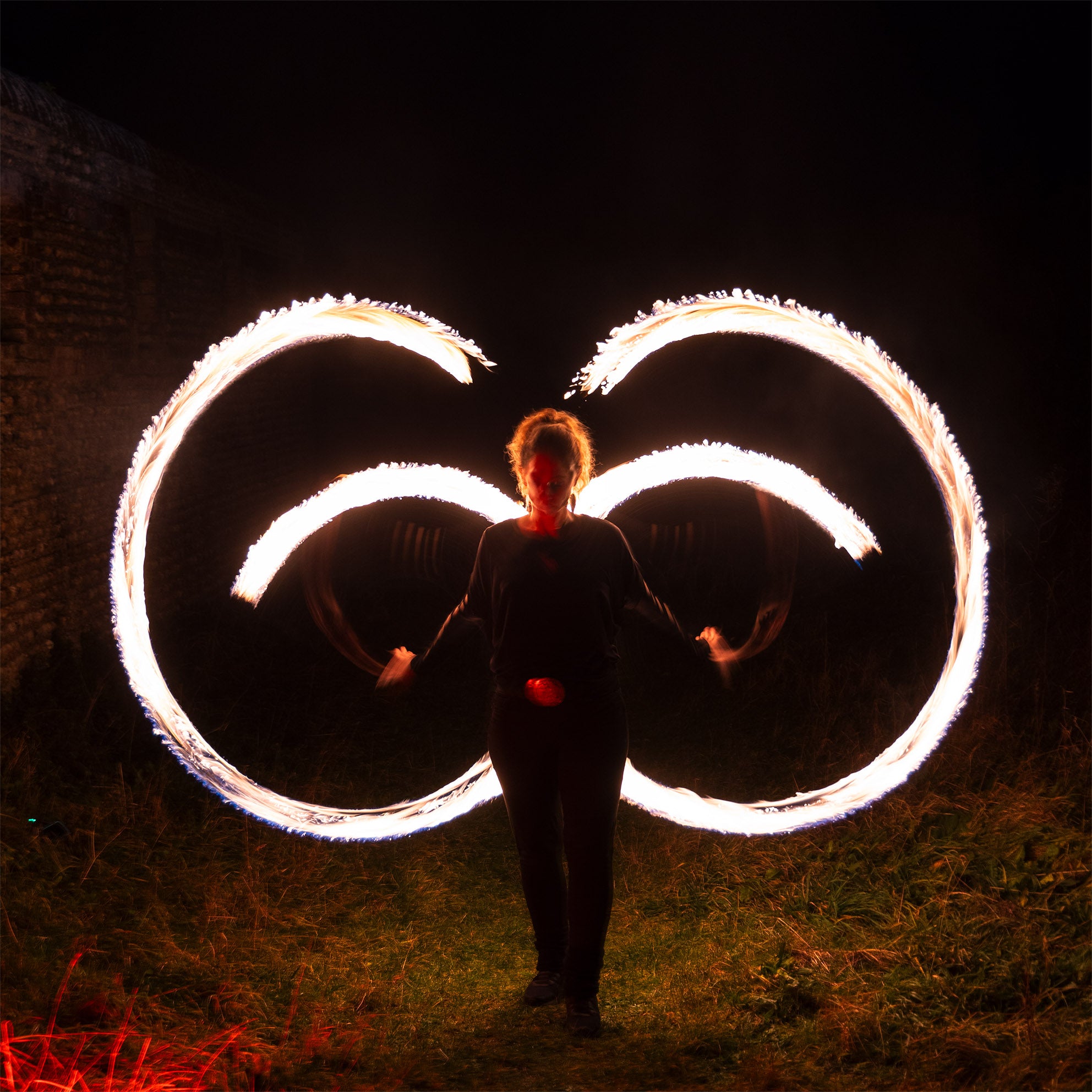 performer with fire poi