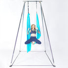 Person sitting in yoga hammock