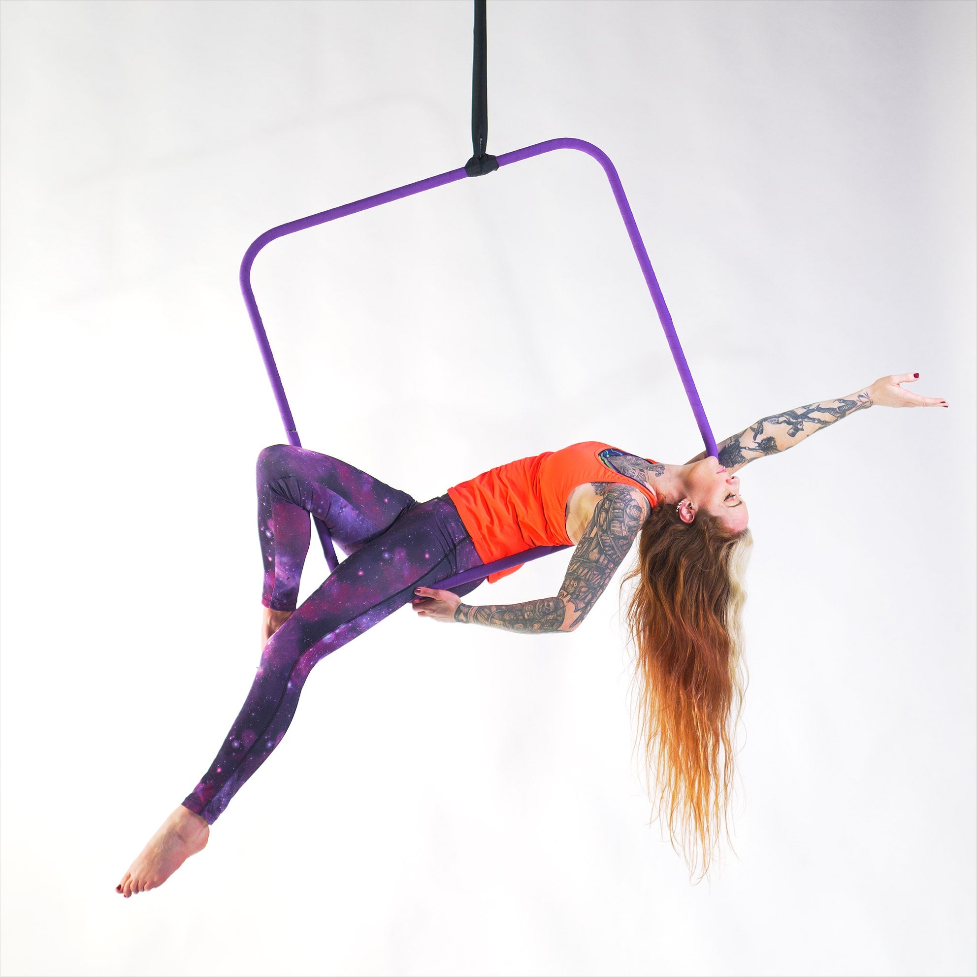 performer in the aerial square